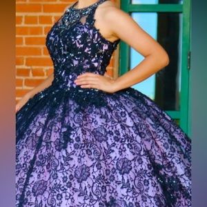 Size 2, Mori lee black and blush gown, with corset bodice.